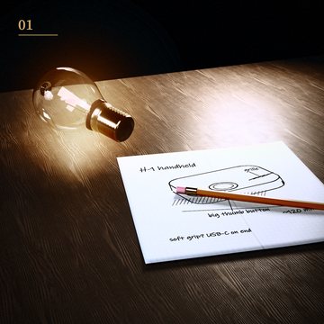 A lit bulb on a workbench beside a napkin sketch of a handheld product and a pencil
