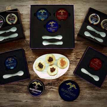 A custom gift set with printed tins, spoons and fitted presentation boxes