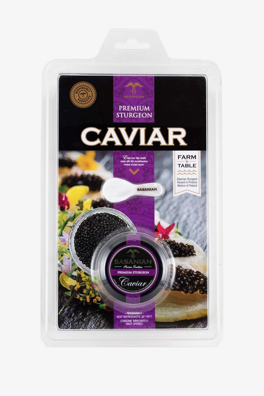 A retail blister card with a clear formed blister holding a tin and a spoon, with a hang hole at the top