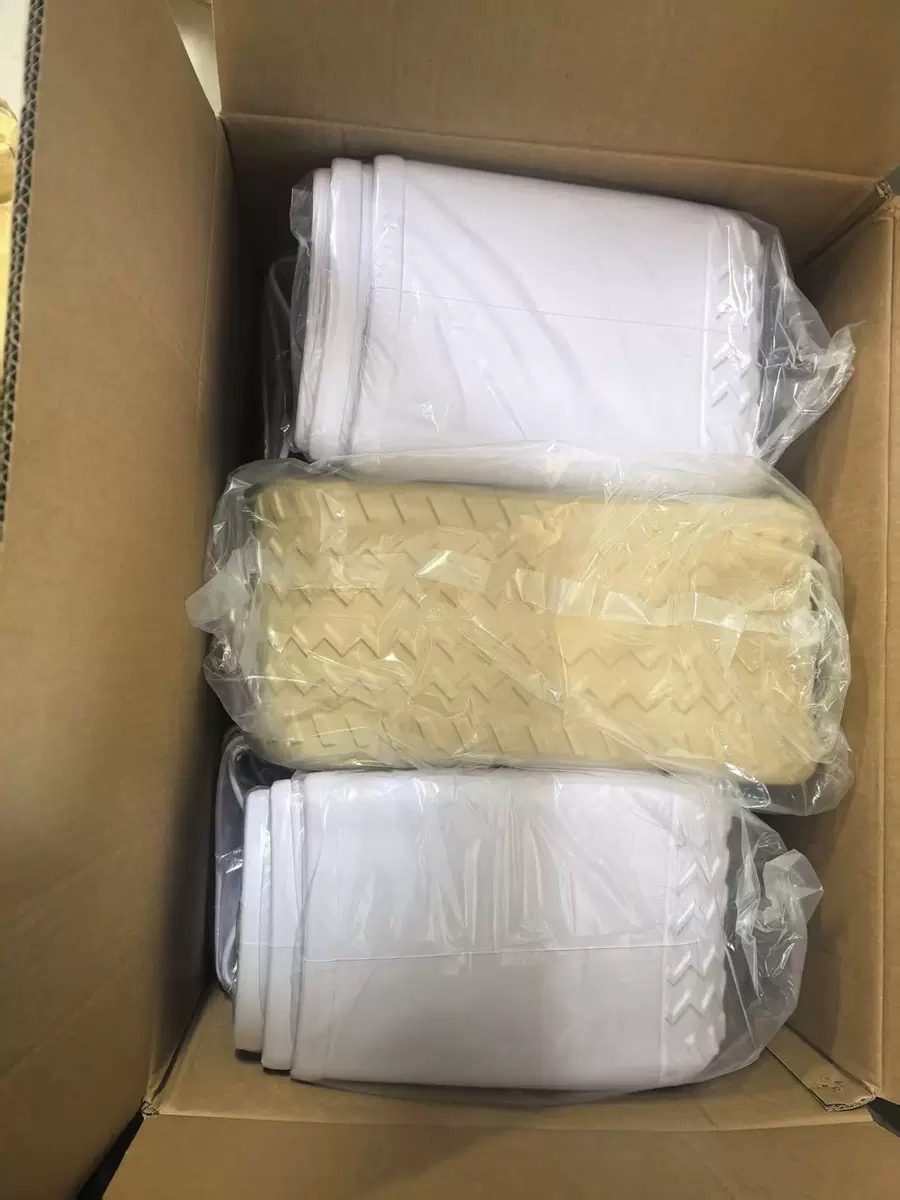Molded parts bagged inside an export carton
