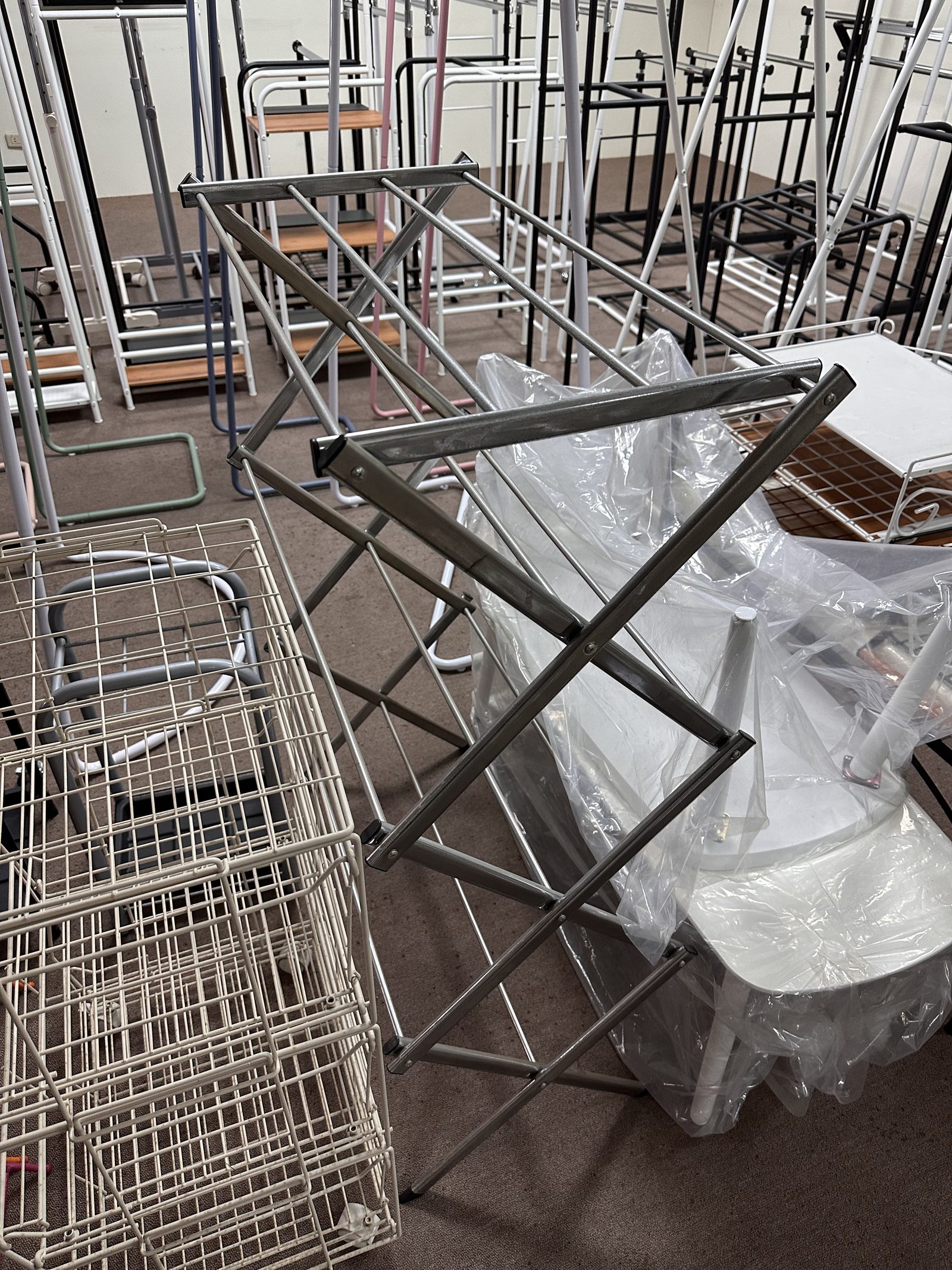 Welded wire frames and folding stands in production at a partner factory