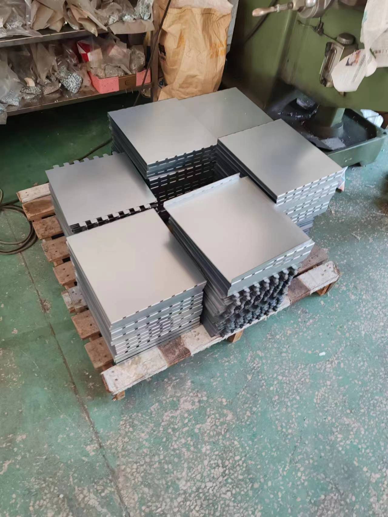 A pallet of formed sheet-metal panels at the factory, before the final payment to the supplier is released