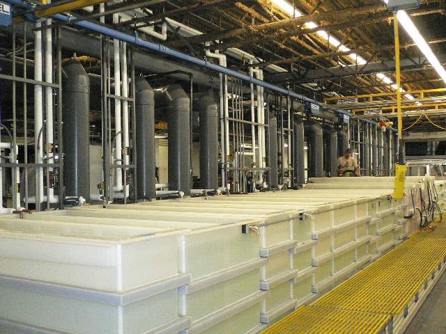 Parts are degreased, rinsed, and phosphate-coated before any powder is applied