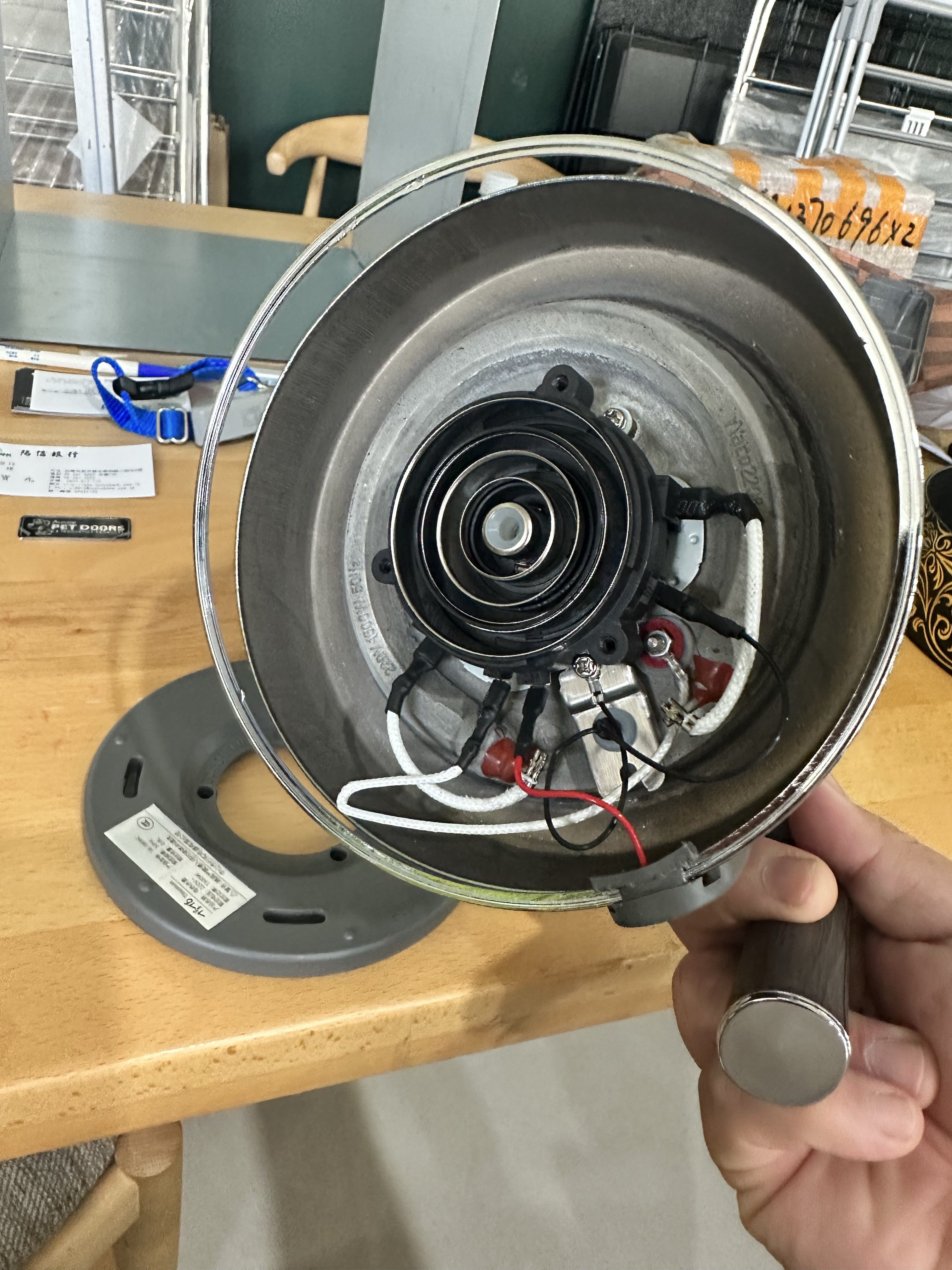 Heating assembly opened on the bench — reverse engineering, not a guess.