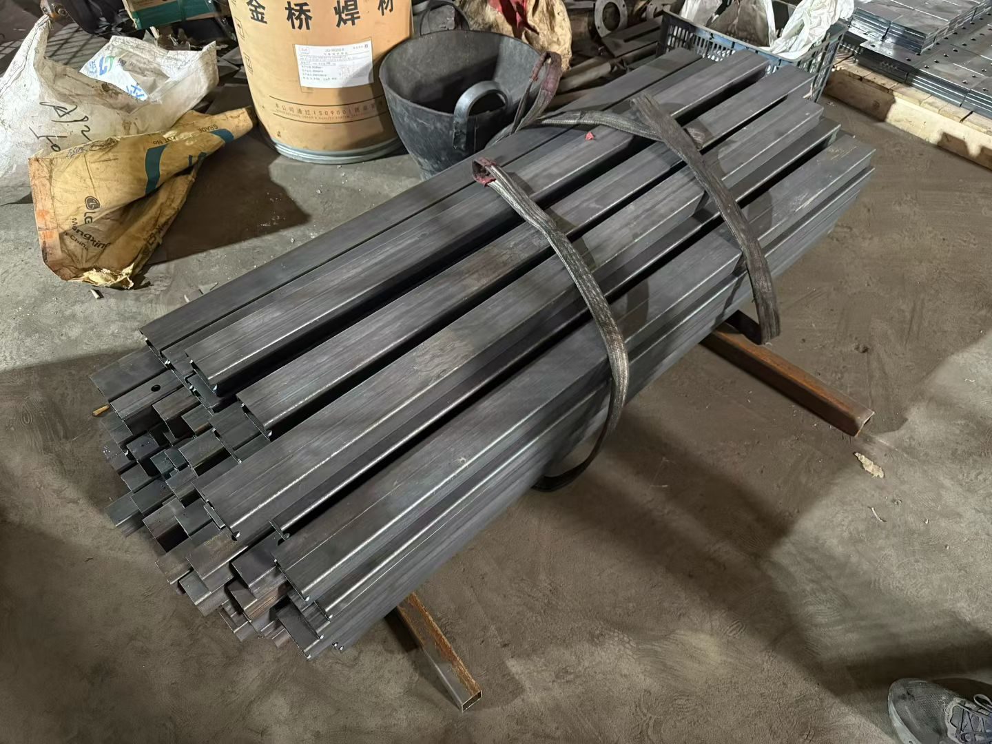 Tube stock staged for fabrication.