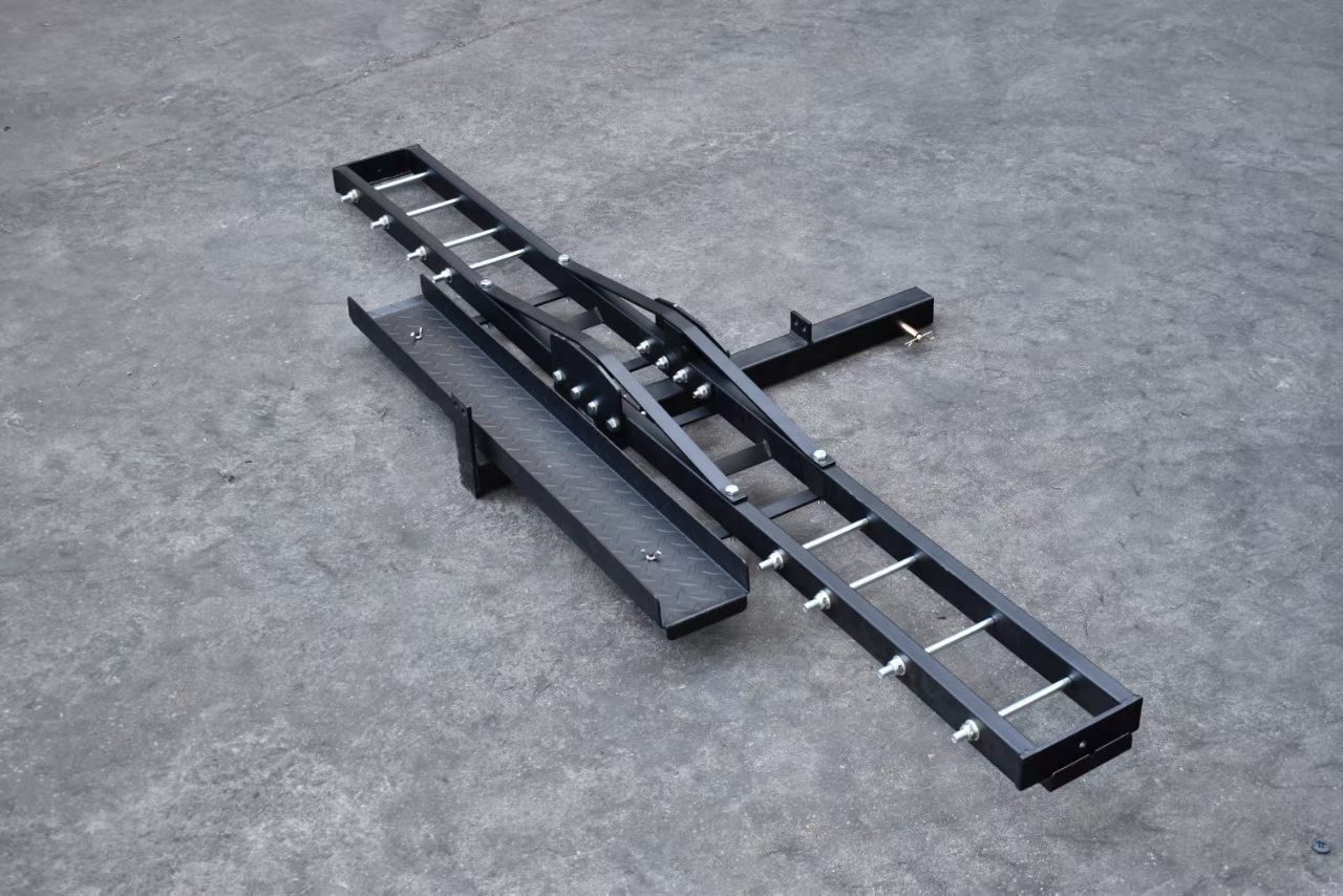 Hitch-mount motorcycle carrier, welded and powder-coated.