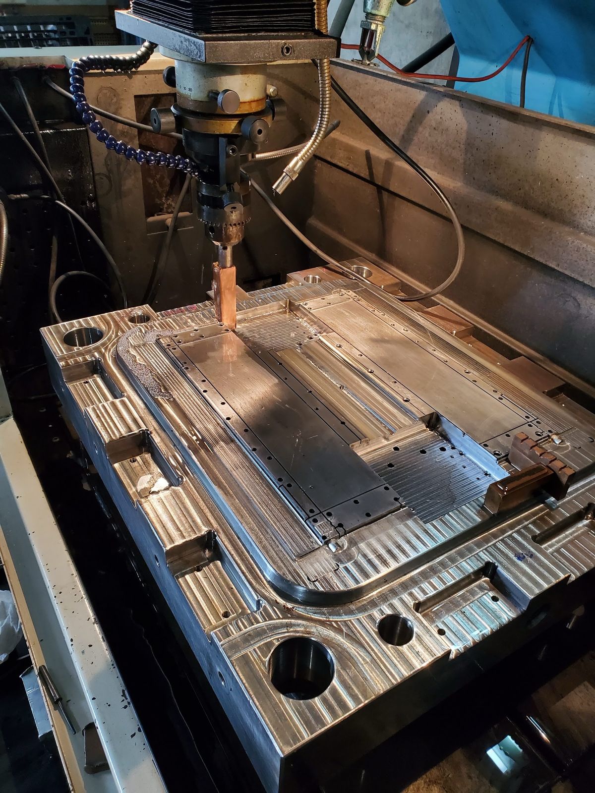 A mold plate, cavity side up.