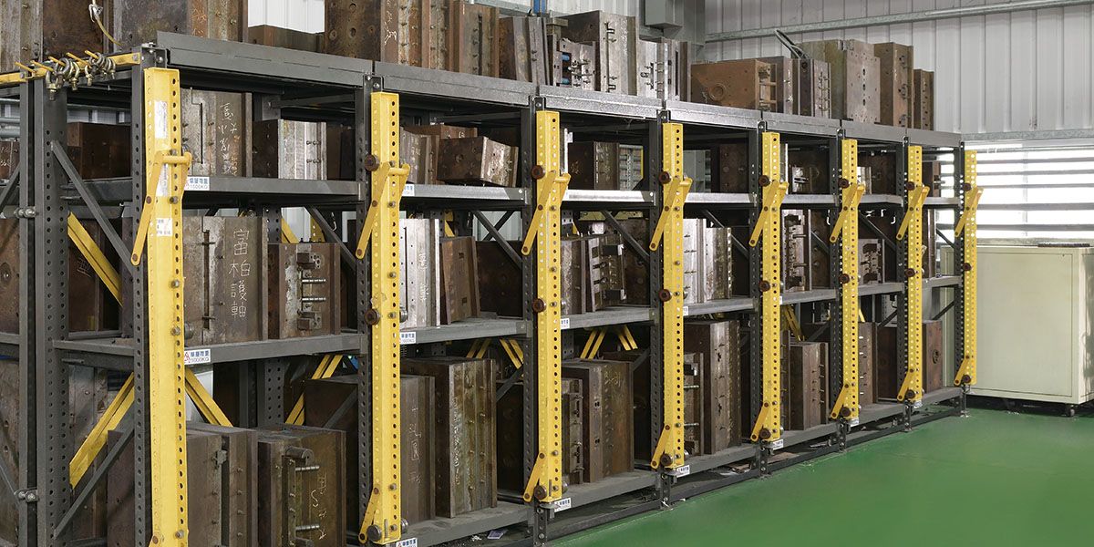 Racks of finished assemblies in storage.