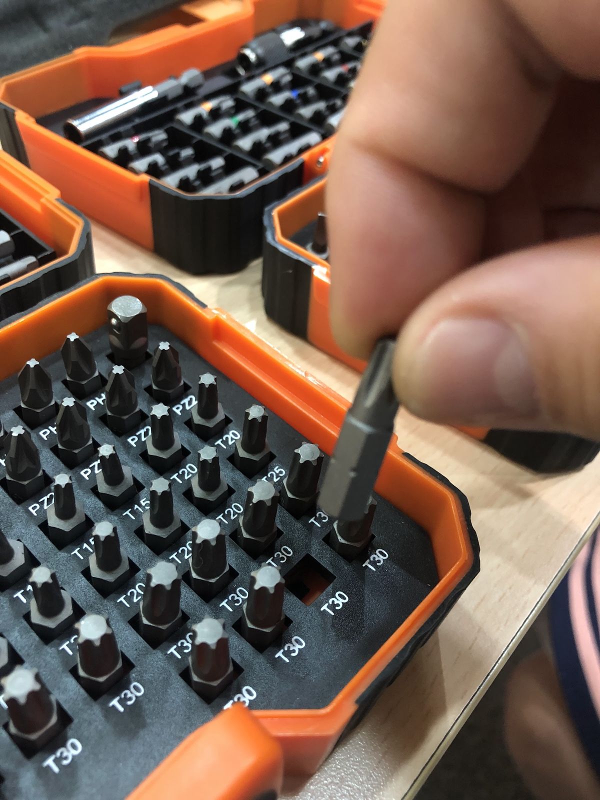 Screwdriver bits in a fitted, molded plastic case.