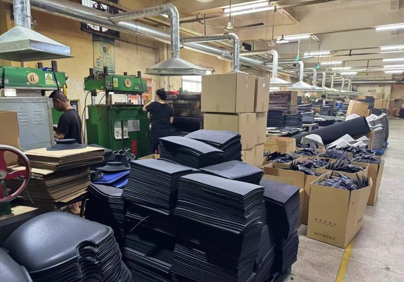 A cutting floor with stacked cut panels and foam