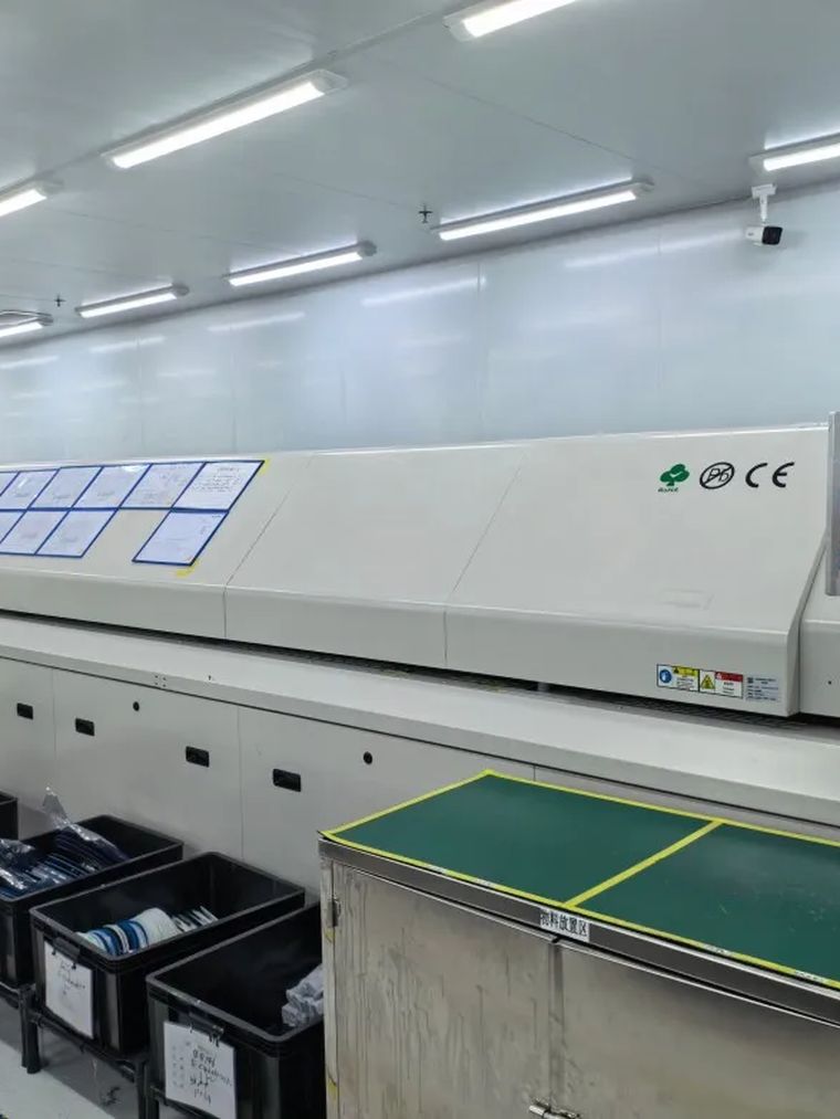A reflow oven on an electronics assembly line