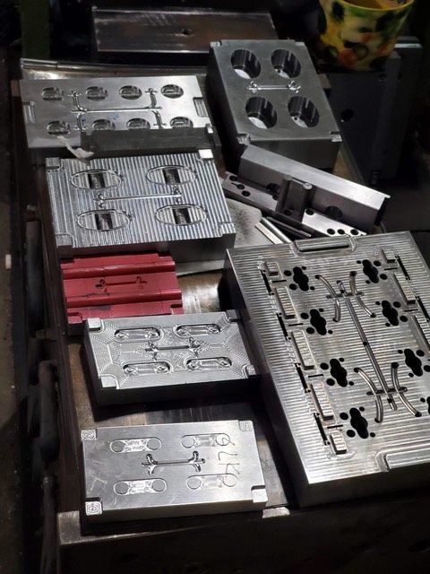 Cavity inserts and plates, cut and waiting for assembly.
